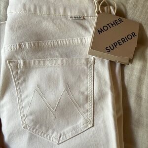 Mother brand new never worn jeans.  High waisted looker ankle fray. Color white